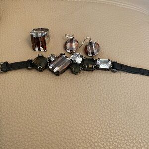 Henry Bendell classic leather strap bracelet, ring (size 6ish) and earring.